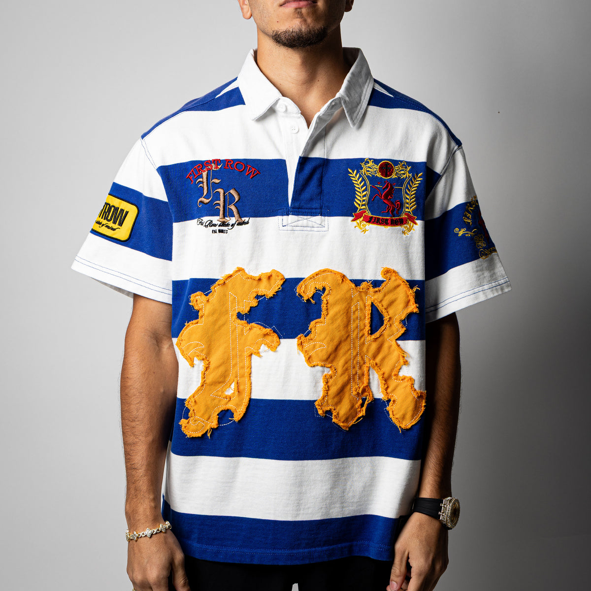 First Row ( Blue / White Polo )