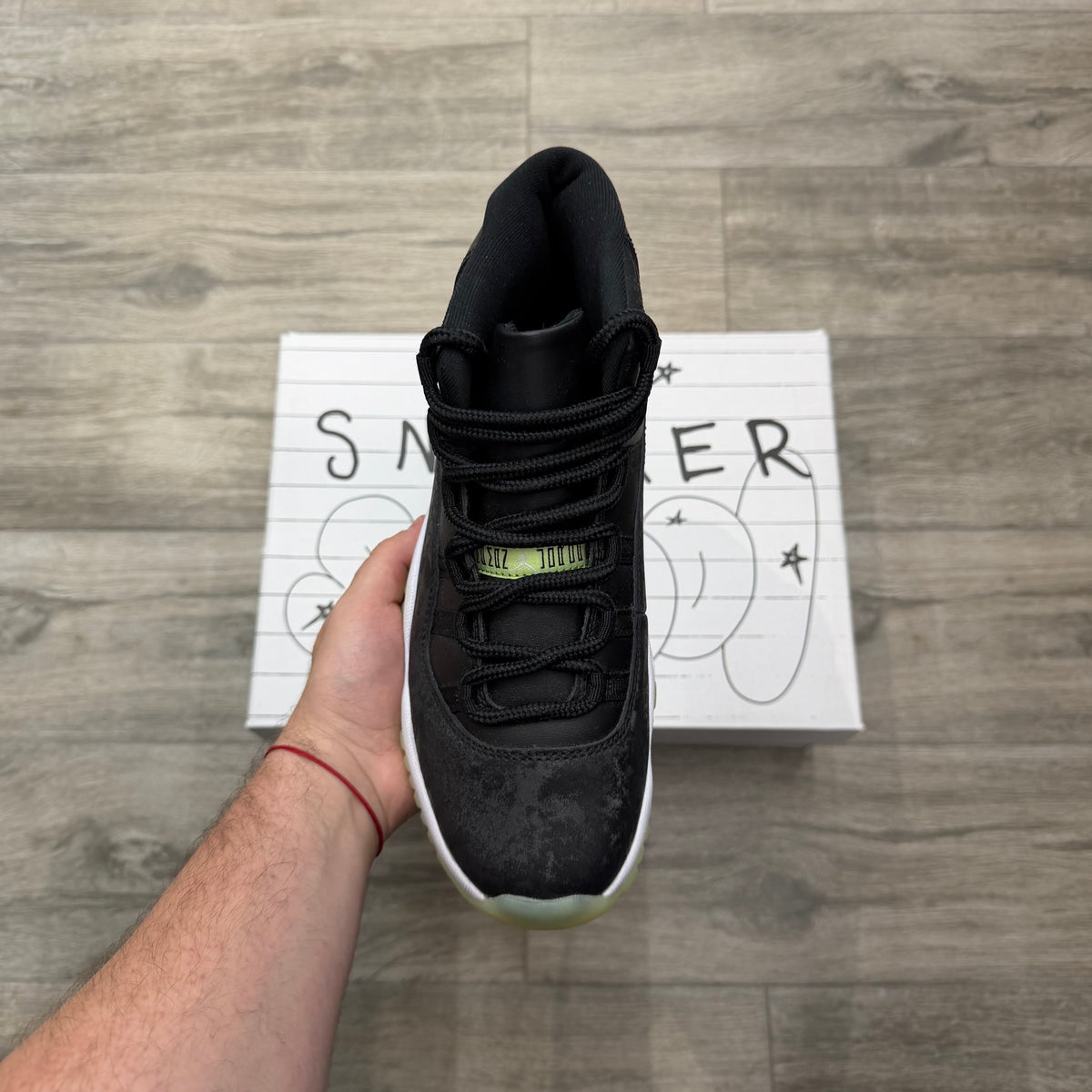 Jordan 11 Retro “Black Barely Volt”