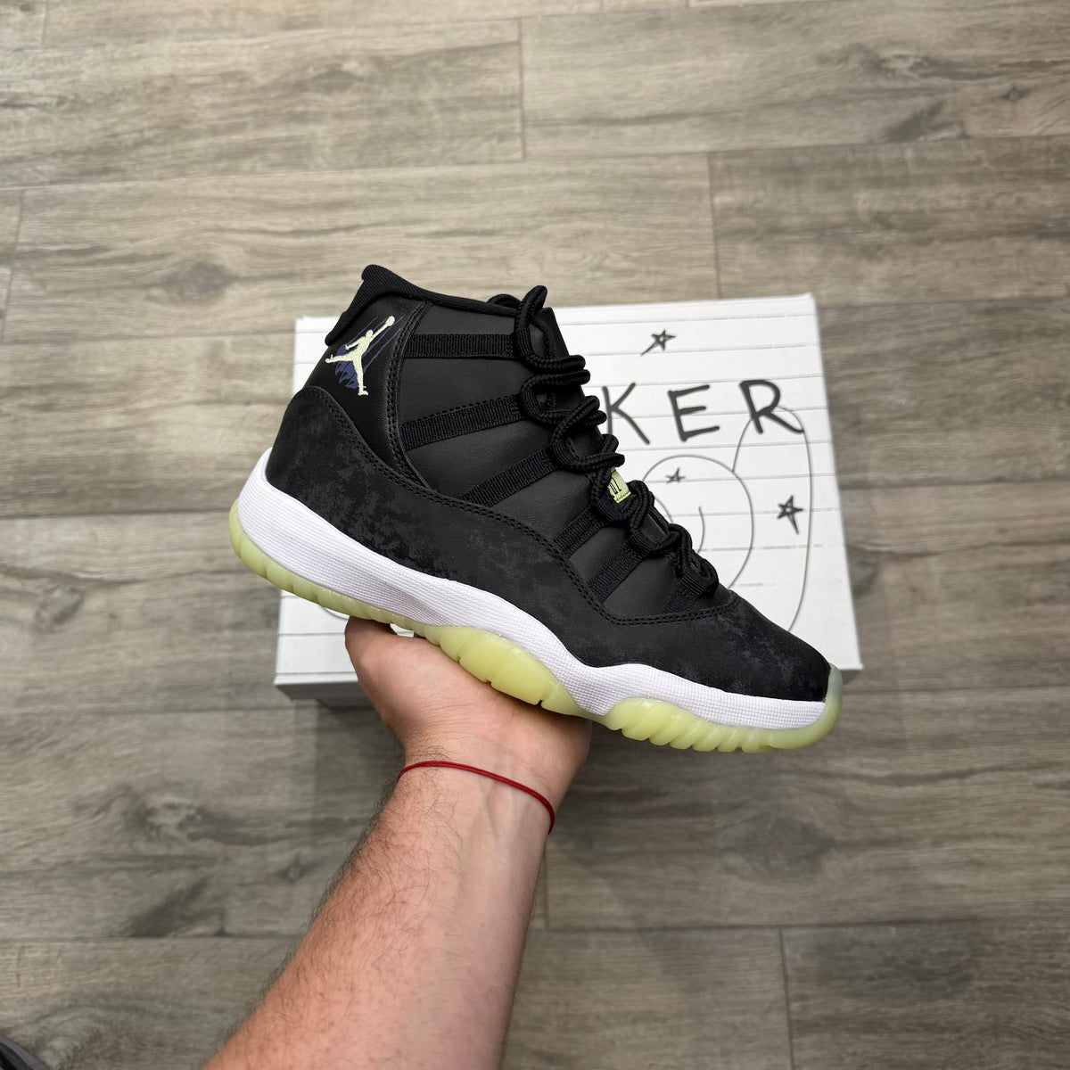 Jordan 11 Retro “Black Barely Volt”