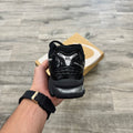 Asics Gel-Kayano 14 en negro y plateado