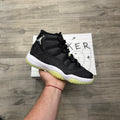 Jordan 11 Retro “Black Barely Volt”